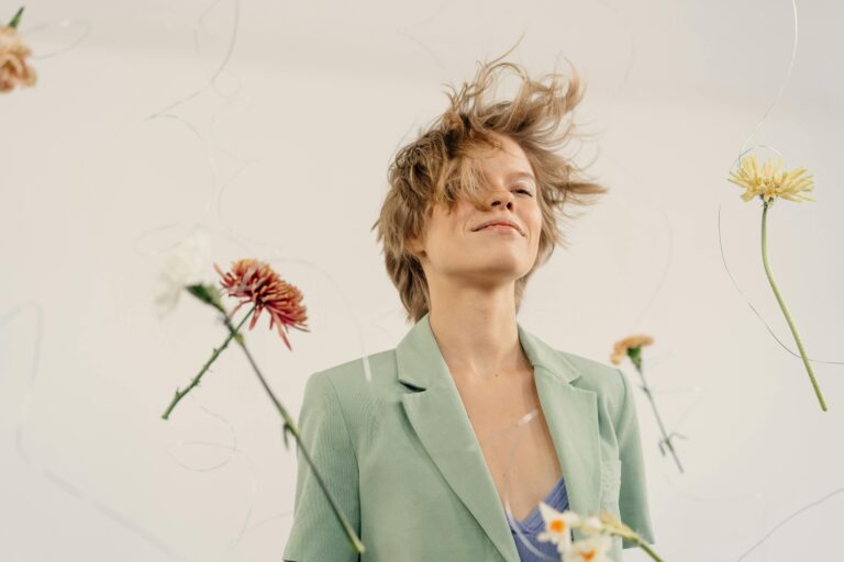 Female founder floating in the air, representing freedom in building a service-based business